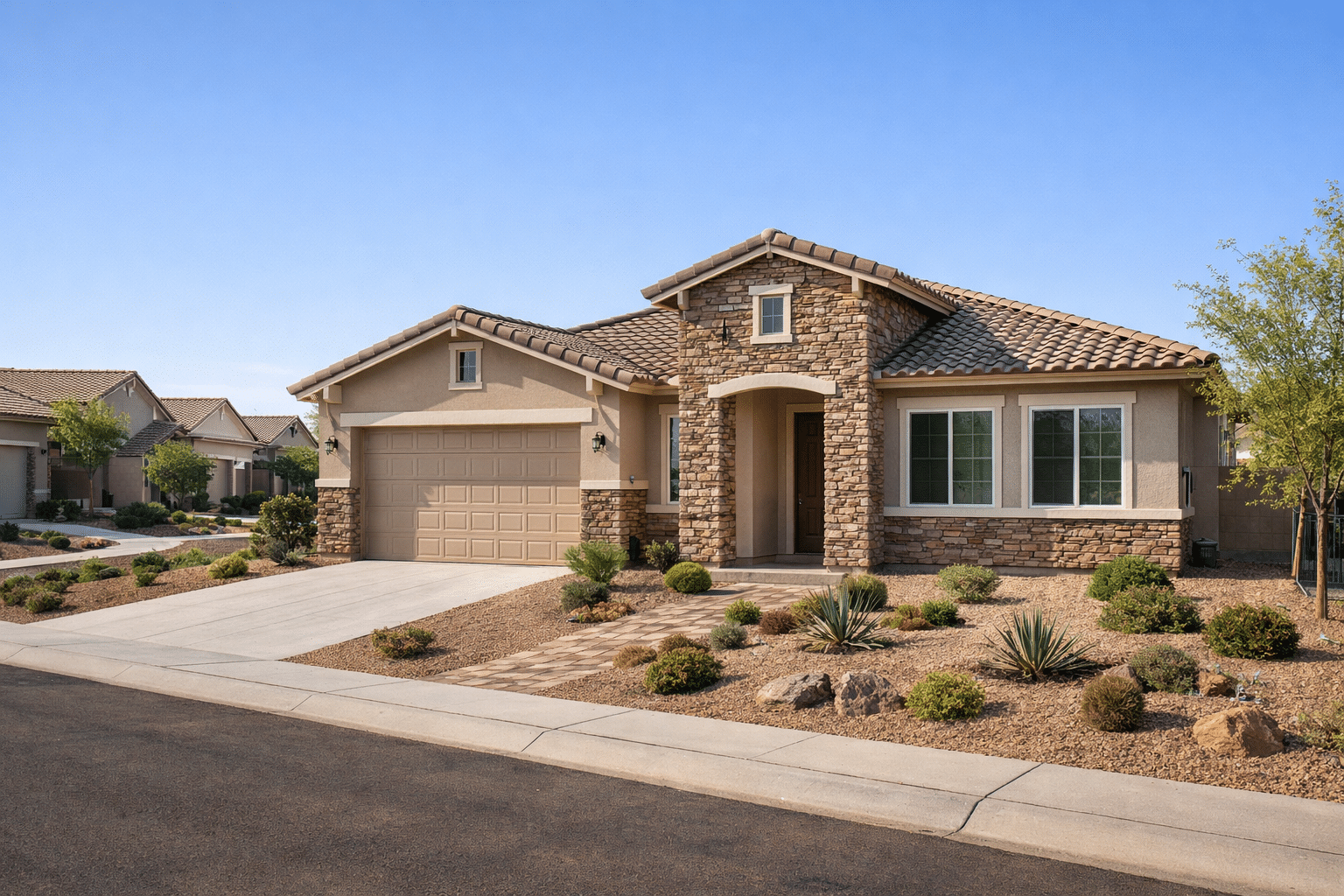 New construction home in southeast Gilbert with updated exterior finishes and desert landscaping.