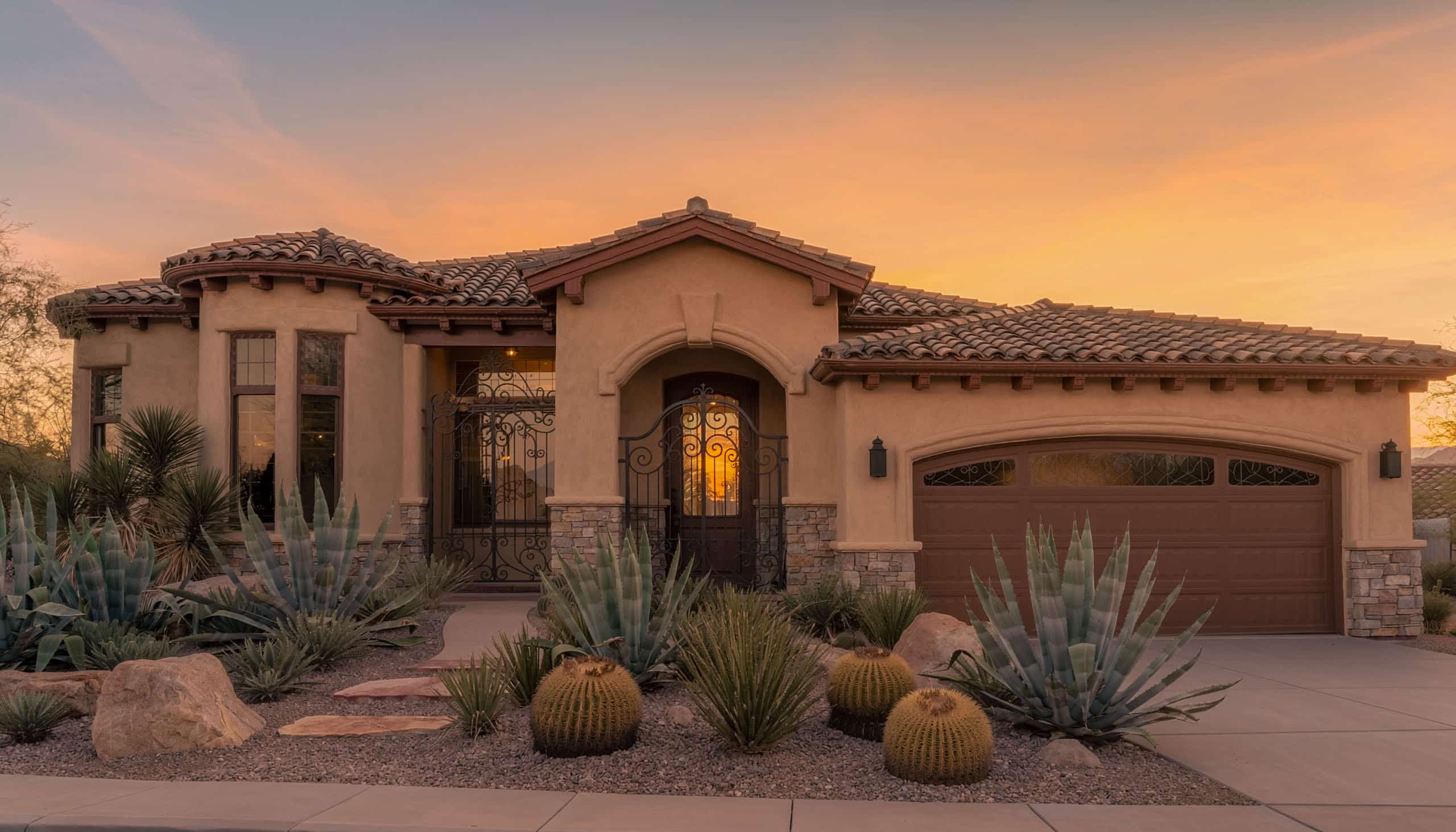 A clean, eye-level architectural photograph of a luxury single-story home