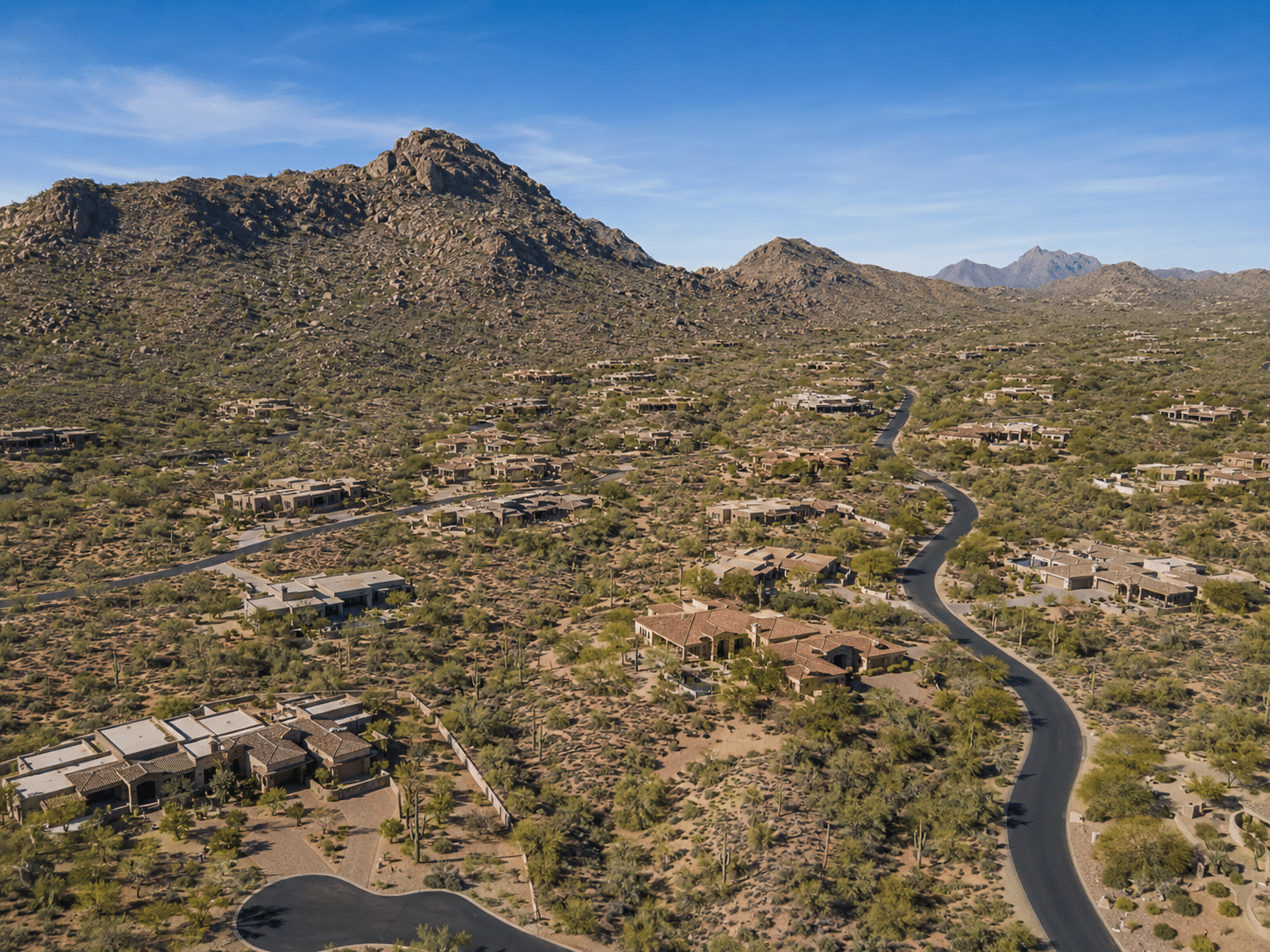 Hidden Hills homes for sale in Scottsdale with gated desert community views and mountain backdrop - West Usa Realty