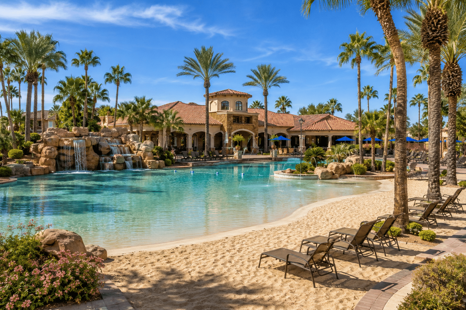 Val Vista Lakes clubhouse pool and sandy beach lagoon Gilbert Arizona